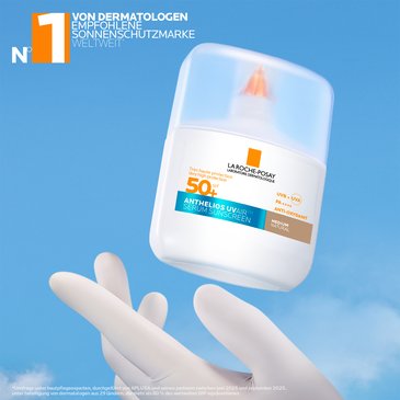 Anthelios UV Air getönt SPF 50+ schwebend über einer Hand, mit Hinweis auf führende dermatologisch empfohlene Sonnenschutzmarke weltweit.