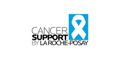 Cancer Support by La Roche-Posay Logo mit weißer Schleife auf blauem Hintergrund